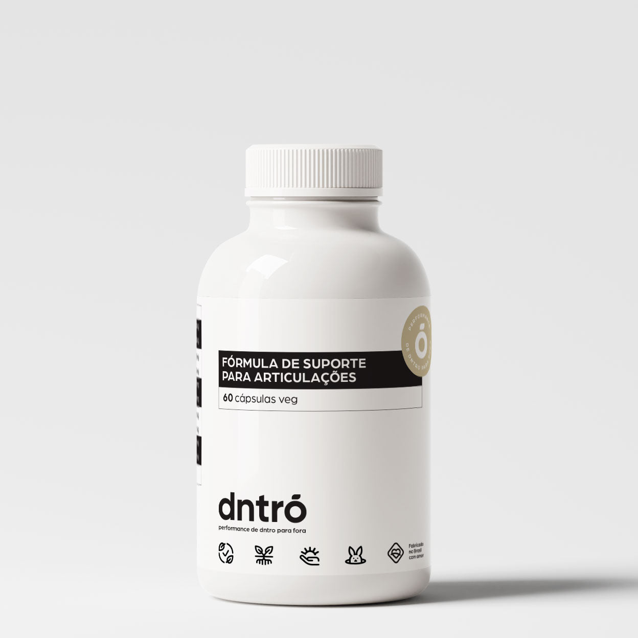 Frasco do suplemento Dntró Fórmula de Suporte para Articulações com 60 cápsulas veganas. Produto desenvolvido para saúde articular, com embalagem branca minimalista, selo de pureza e ícones de produto vegano, sem glúten, sem lactose e não testado em animais.