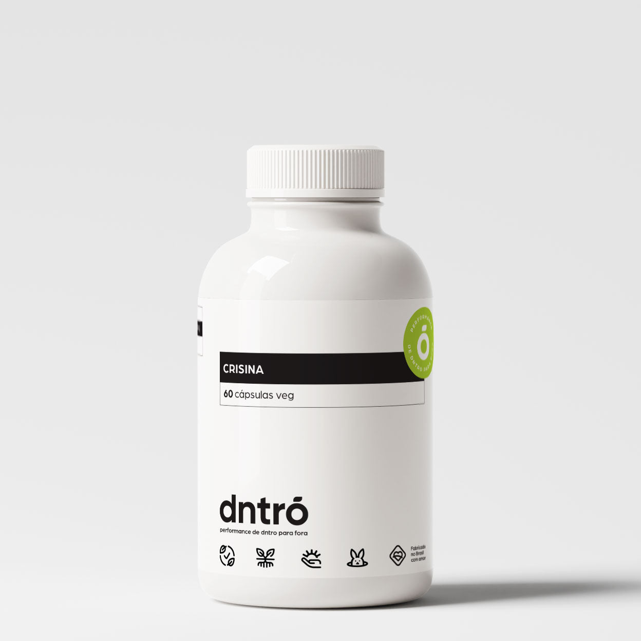 Frasco do suplemento Dntró Crisina com 60 cápsulas veganas. Produto natural voltado para equilíbrio hormonal e suporte antioxidante. Embalagem branca com selo de pureza e ícones de produto vegano, sem glúten, sem lactose e não testado em animais.