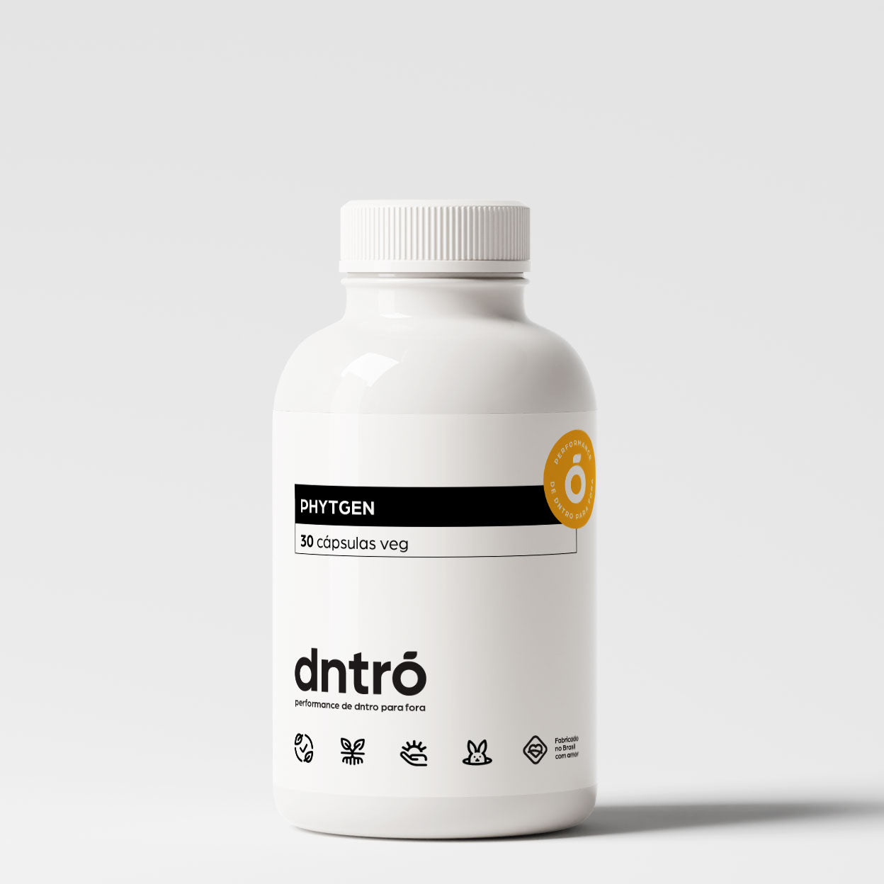 Frasco branco do suplemento Phytgen da marca dntró, contendo 30 cápsulas vegetais. O rótulo tem design minimalista com fundo branco, detalhes em preto e um selo laranja indicando "ativo patenteado". Na parte inferior, há ícones que destacam benefícios como ingredientes naturais, ação adaptógena, fórmula vegana, não testado em animais e produzido com ciência.