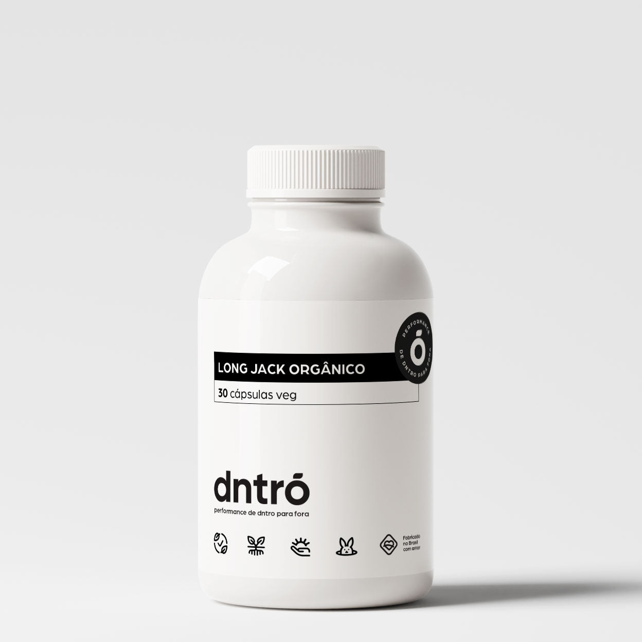 Frasco do suplemento DNTRO Long Jack Orgânico com 30 cápsulas veganas. Embalagem branca com rótulo minimalista preto e selo escuro. Produto natural voltado para energia, vitalidade masculina e performance. Vegano, não testado em animais e sem aditivos artificiais.